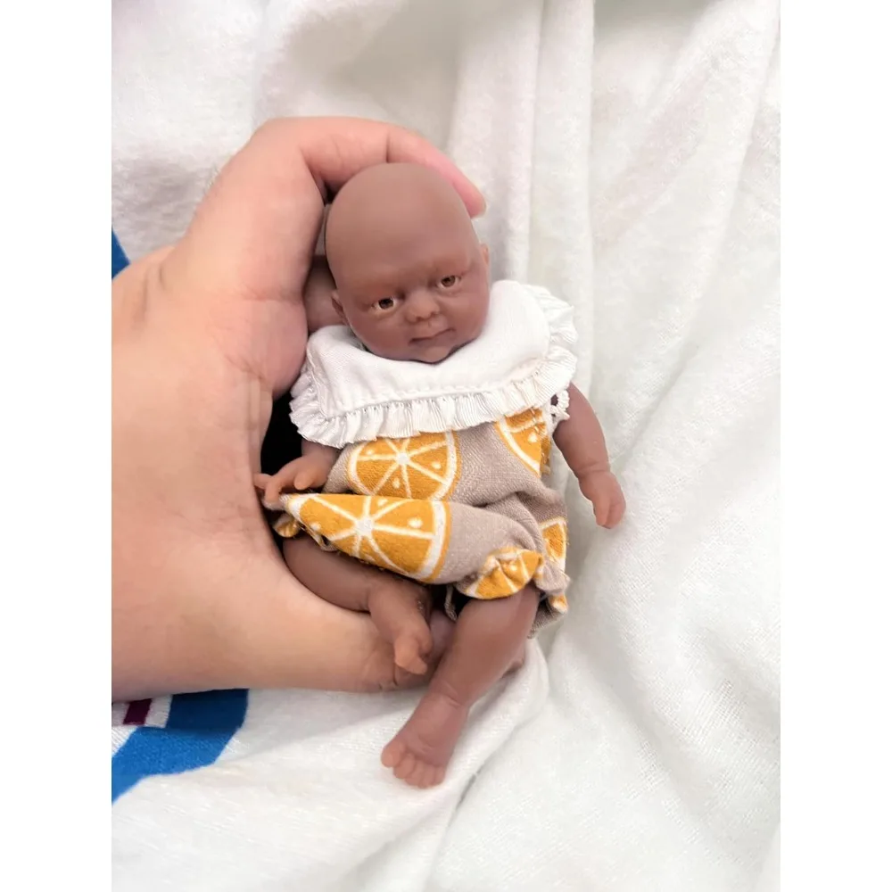 

4.5 Inch Reborn Baby Doll Silicone Full Body Lifelike Brown Eyes Open Baby Girl with Clothes Accessories Set