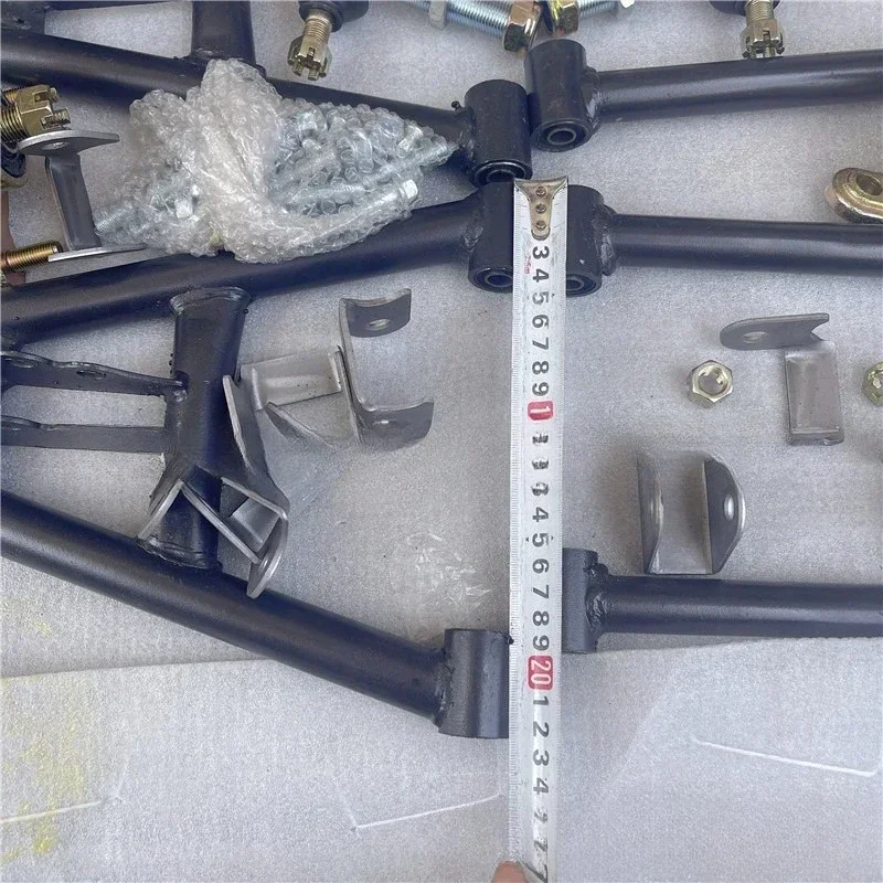 Self-made four-wheeled steel pipe off-road carding beach car modified to hang front disc brake, extended rocker arm shock