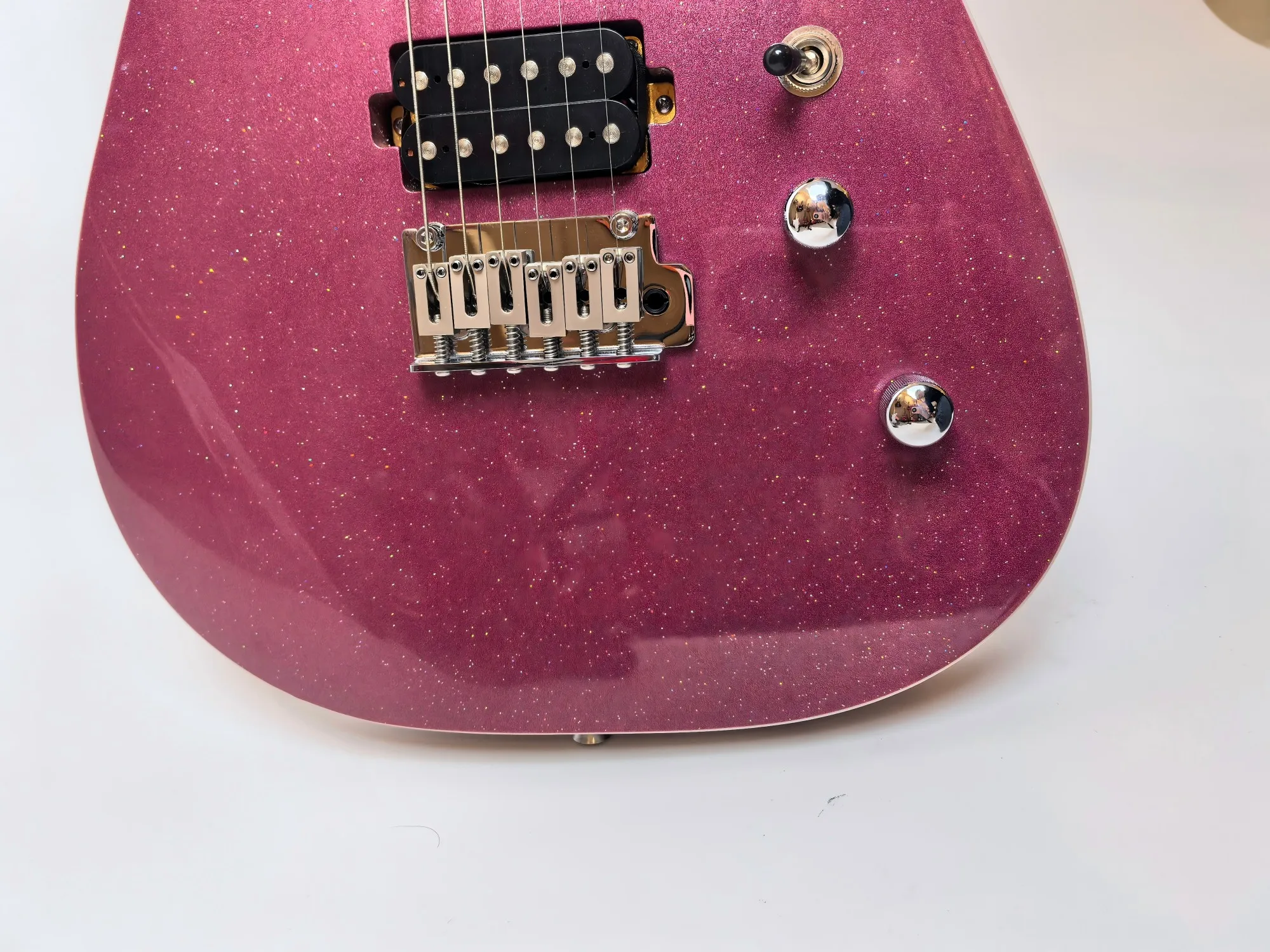 Customizable, in stock, large purple particles 24 cents electric guitar, Augustan body, plus maple head.