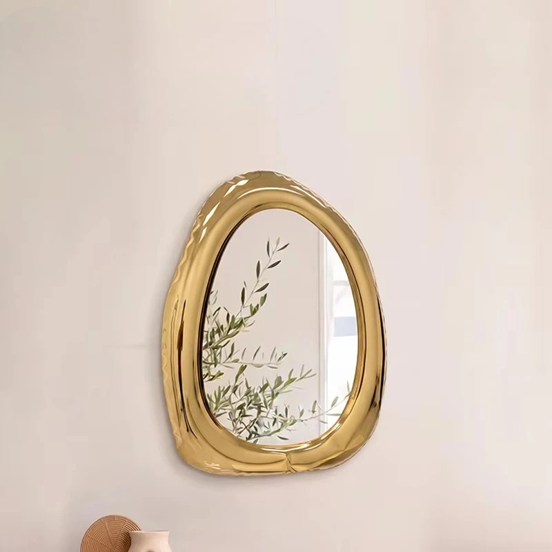 Modern pebble-shaped gold-plated stainless steel frame wall mirror