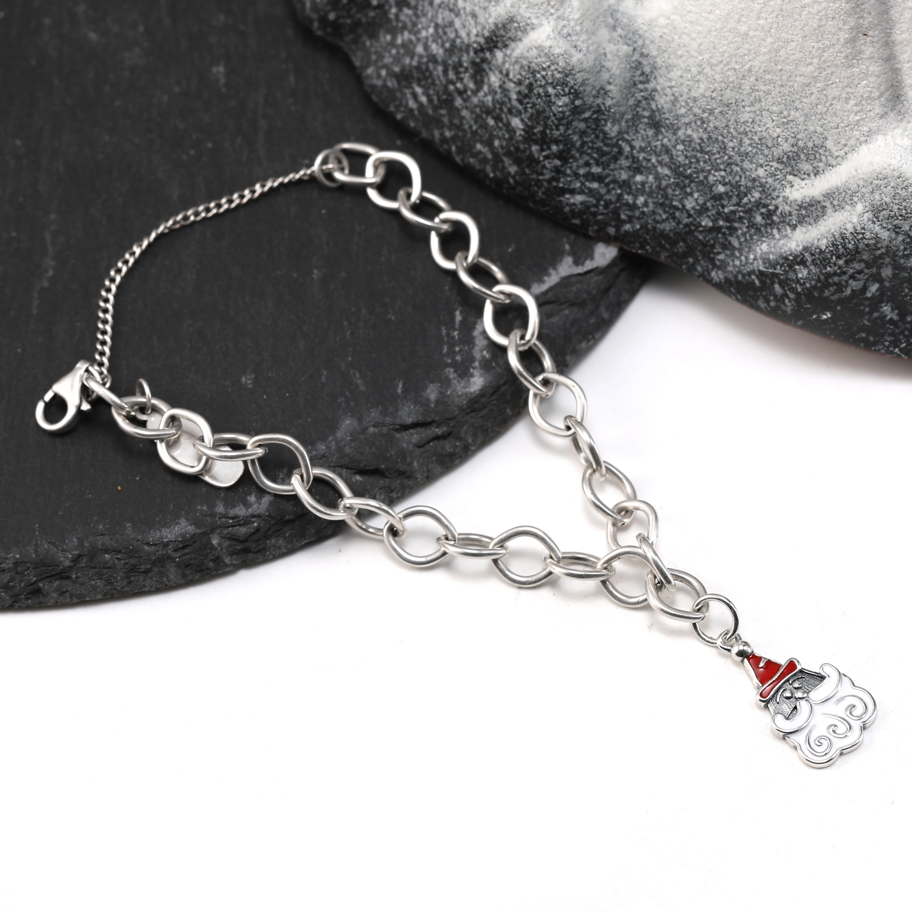 

Genuine 925 sterling silver Forged Link Charm Bracelet paired with a colour enamel Sweet Santa Claus pendant