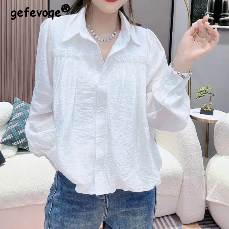 

Korean Version of Fashionable Wooden Ear Edge White Shirt for Women 2023 Autumn New Loose Fit Fold Design Long Sleeve Blouse