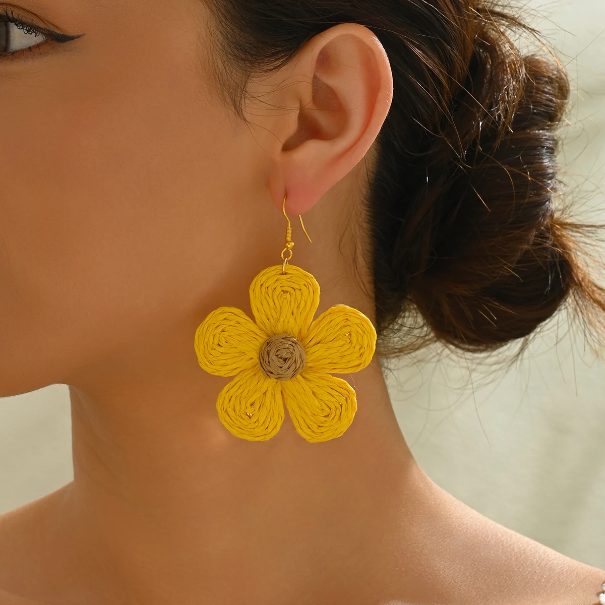 A Pair of Stylish Beach Wind Raffia Flower Hand-woven Earrings For Women are Perfect For Everyday Holiday Wear