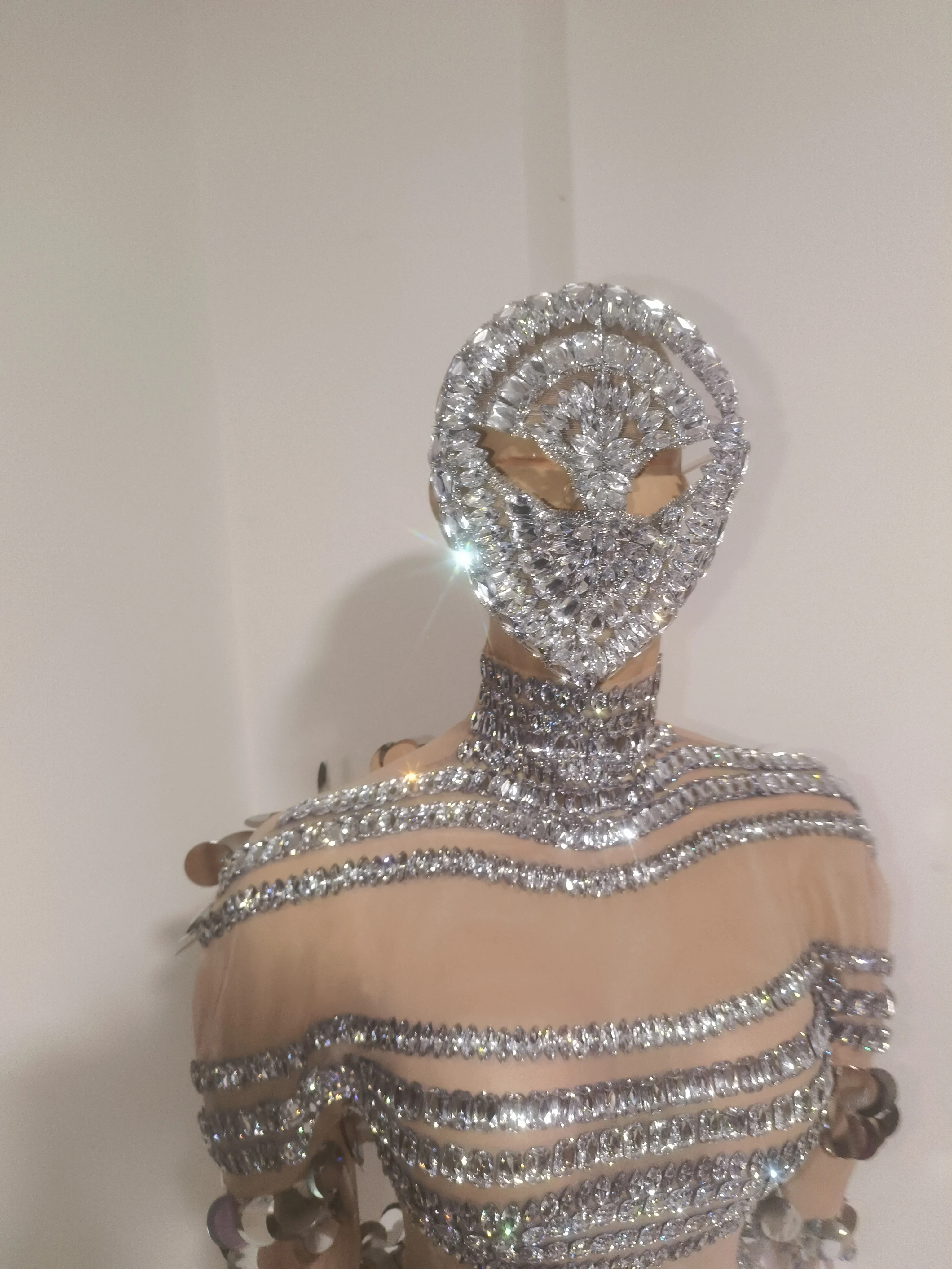 

Luxurious and unique women's crystal net one-piece dress paired with a teardrop-shaped mask performance attire