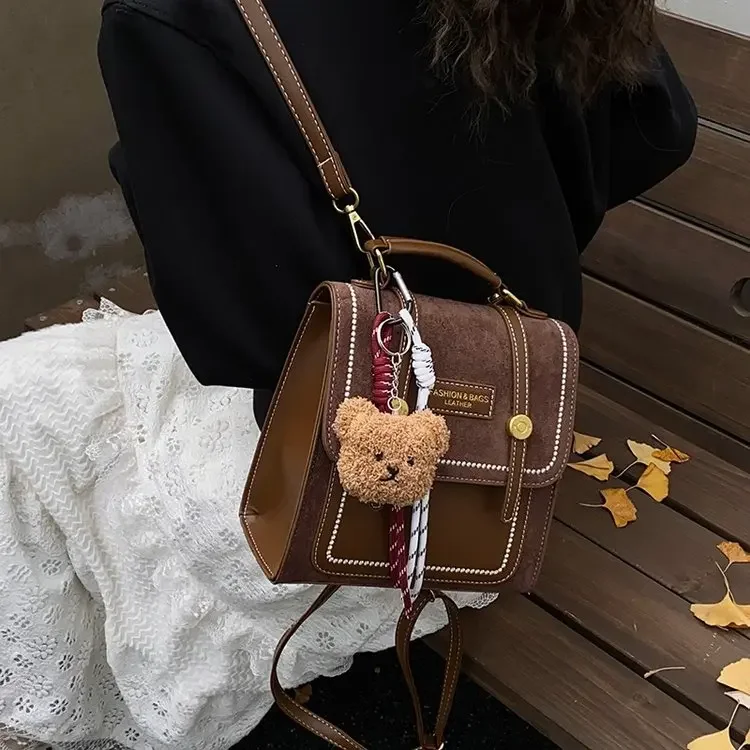 

2026 Women's Retro British Style Shoulder Handbag Portable Messenger Bag for Daily Commute Travel Small Backpack