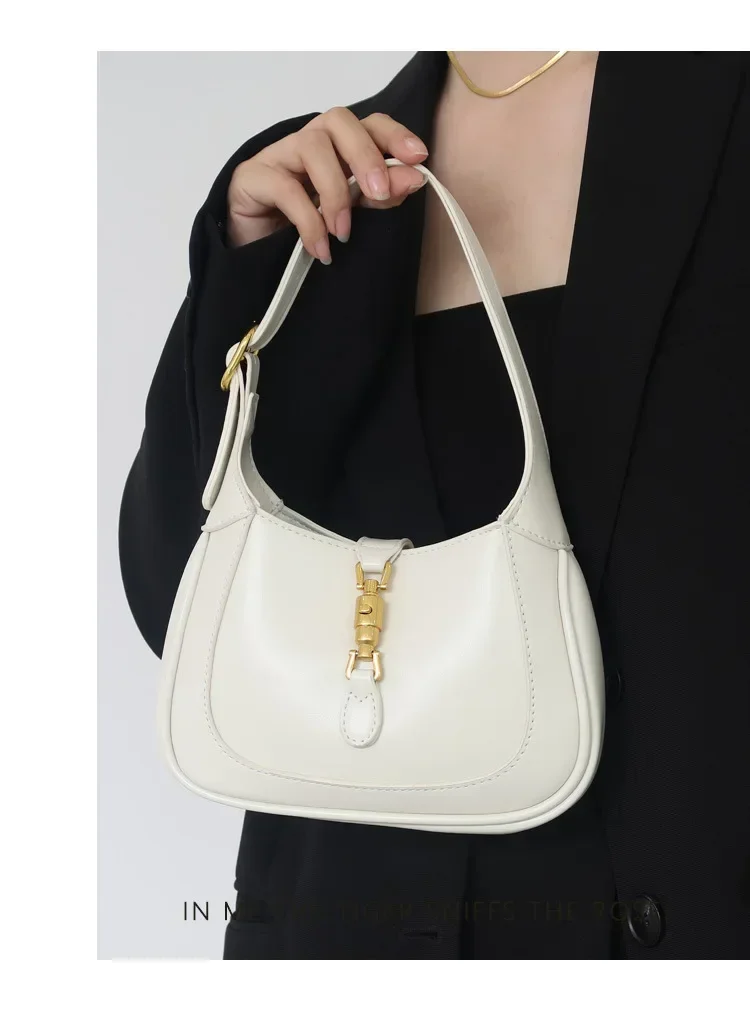 1961 retro horse bit buckle mini French underarm bag women spring and summer new texture niche saddle crossbody bag