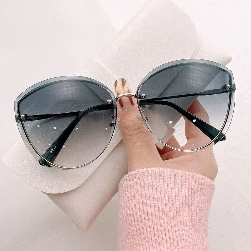 

High Quality Women's Oval Rimless Sunglasses Lady Metal Cay Eye Shades for Women Driving Glasses Sonnenbrille Zonnebril Dames