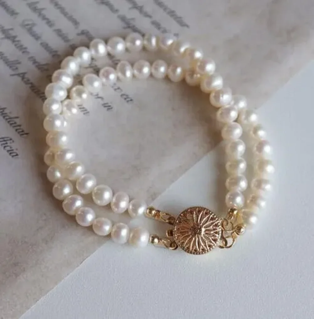 

Double Strand Nanhai AAA 5-6mm White Pearl Bracelet 7.5-8 14K Gold Buckle