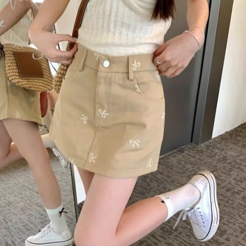 2026 Summer Khaki Bow Embroidery Denim Skirt Women High Waist Slim A Line Skirt Anti Peeping Casual All Match Mini Skirt