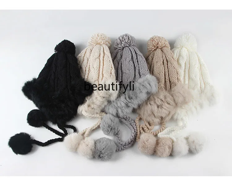 Korean versionof cute rabbit fur piled and thickened Japanese women's winter snowy days warm ear protectors hairball knitted hat