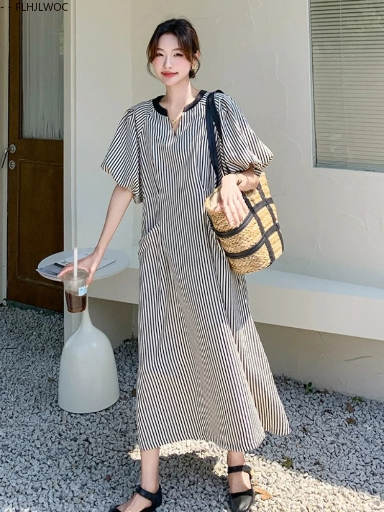 ชุดเดรสหลวมใหม่แฟชั่นผู้หญิงกระเป๋า Retro ฤดูร้อนพัฟแขนสั้นสบายๆสีดําลายเสื้อชุดกับเข็มขัด