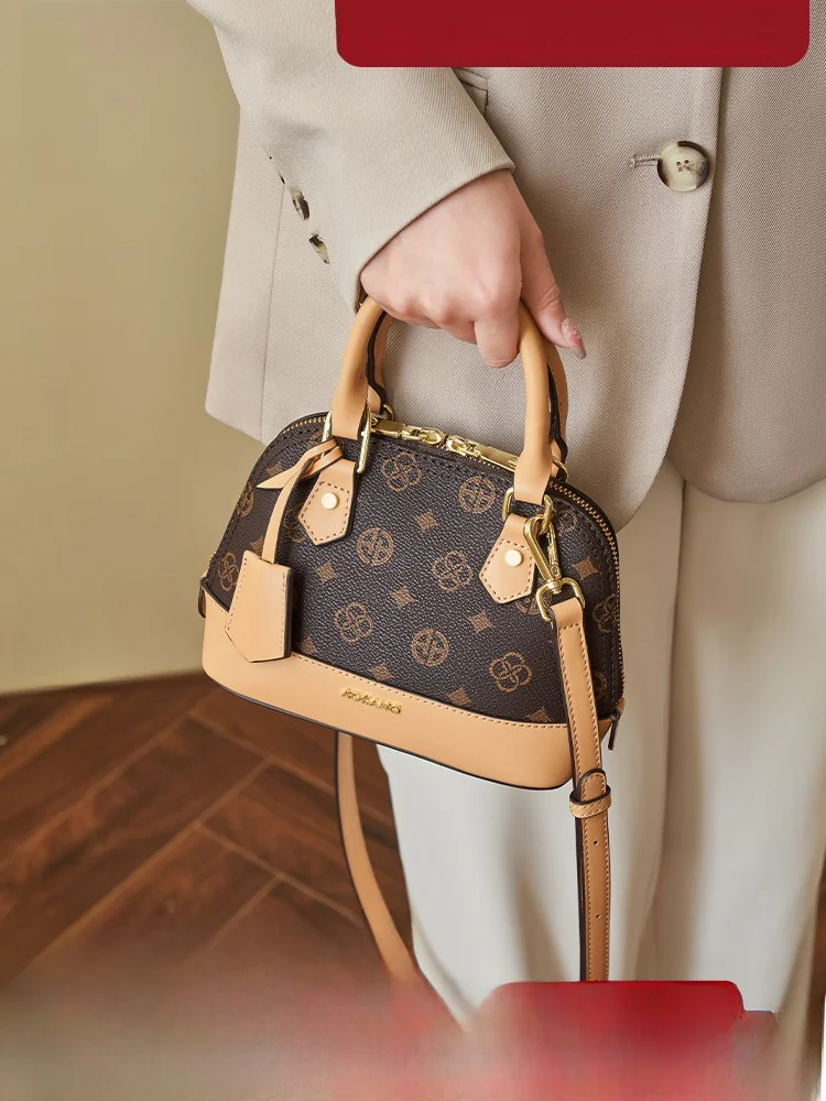 

Aokang ell Handbag 2025 New Faion Large Capaci Women's Handbag Vintage Artistic Sle Commuting Single oulder Bag