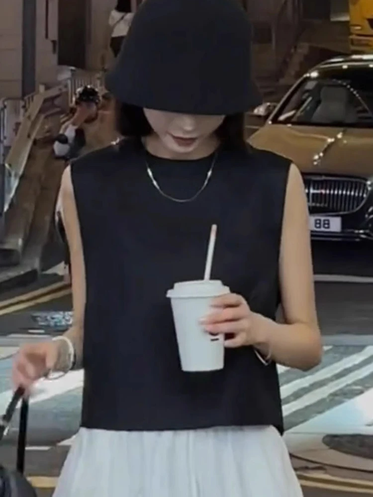 ファッショナブルな通勤用スリムベスト、ゆったりとしたラウンドネック、スプリットデザインのレディーストップス、初秋のカジュアルウェア