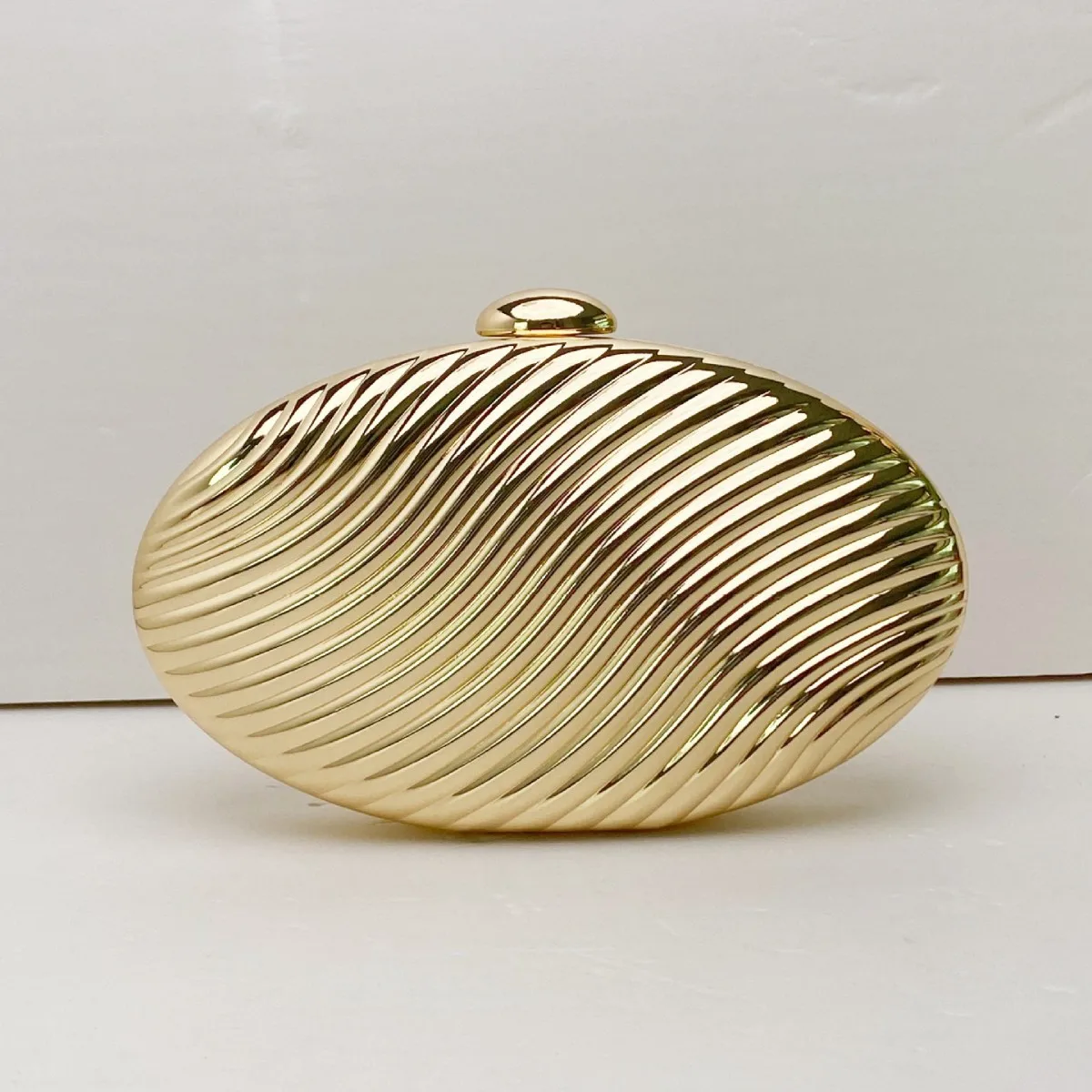 

metal corrugated oval dinner bag high-end evening dress luxury messenger bag bridesmaid pebble clutch bag