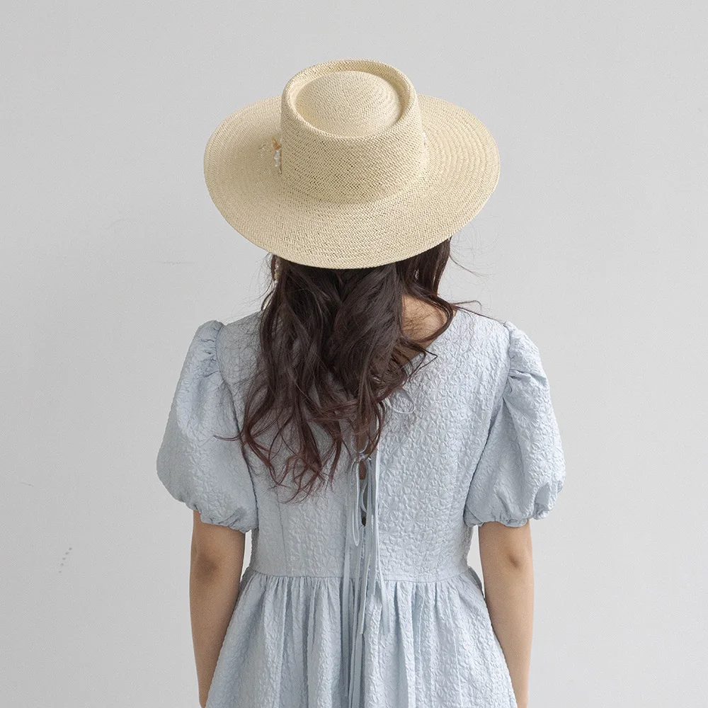 

Spring and summer new fashion leisure pearl conch chain ring top big eave straw hat outdoor beach sun protection hat