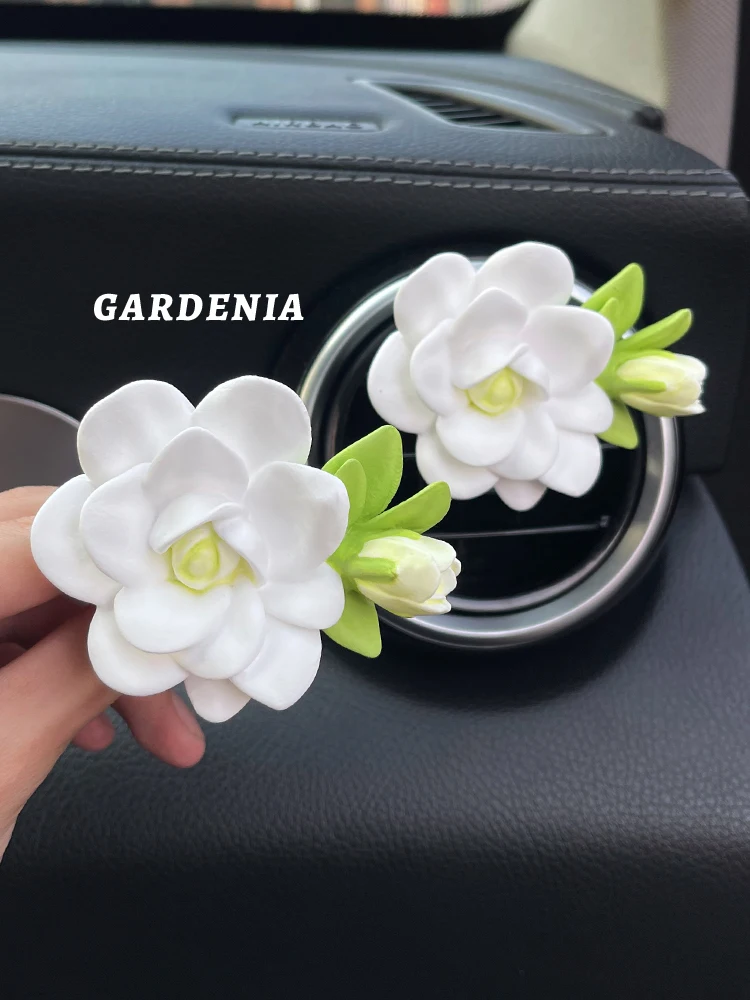 

Car mounted aromatherapy gardenia air conditioner air outlet perfume perfume expansion stone goddess car interior accessories