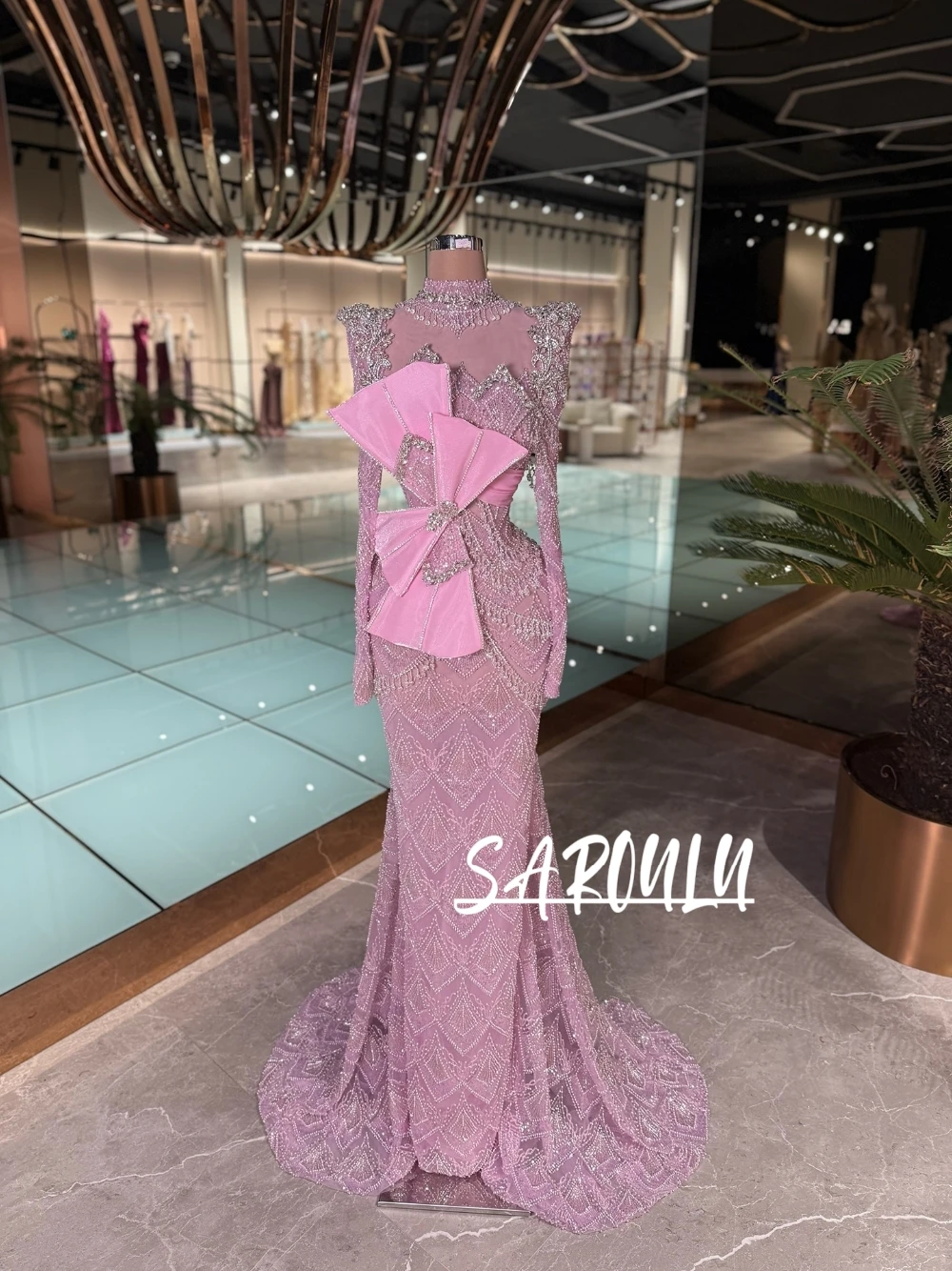 

New Arrival Luxury Pink Sparkly Beaded Evening Dress Women High Neck Long Sleeved Big Bowknot Cut Out Crystals Mermaid Prom Gown