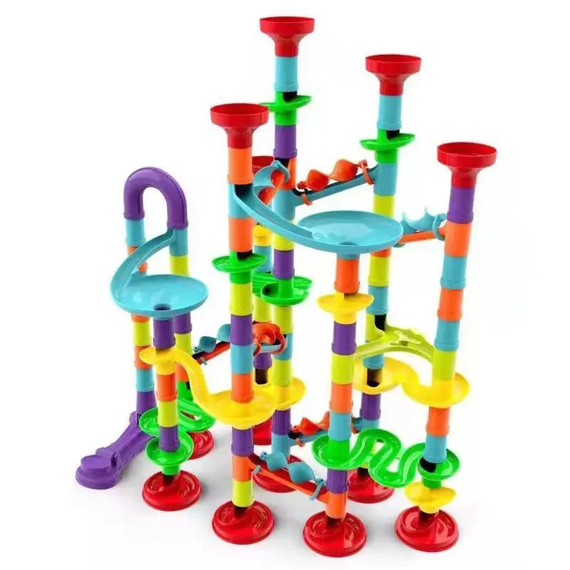 Children's toys with ever-changing slide blocks are inserted into toy ejection pipes to assemble three-dimensional