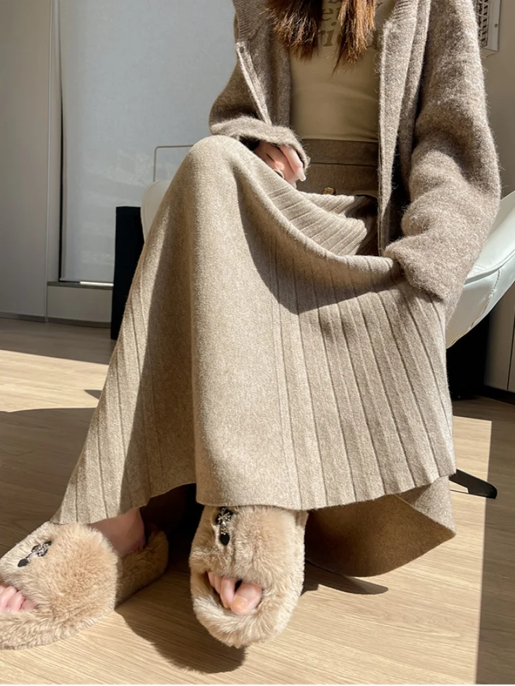 تنورة محبوكة ناعمة لزجة للنساء لخريف وشتاء 2025 بخصر عالٍ للتخسيس تنورة كبيرة متأرجحة على شكل حرف a تنورة مظلة للسيدات