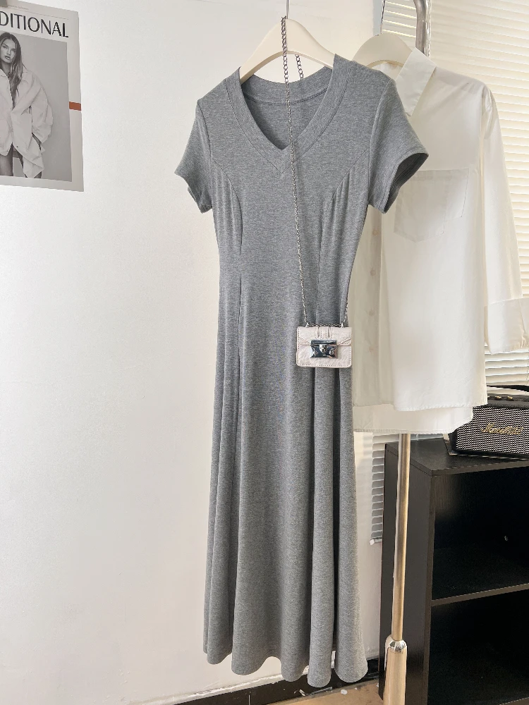 Zjaiss 2025 nouvelle taille cintrée mi-longue noir Style Hepburn robe automne nouveau Modal col en v robe à manches courtes