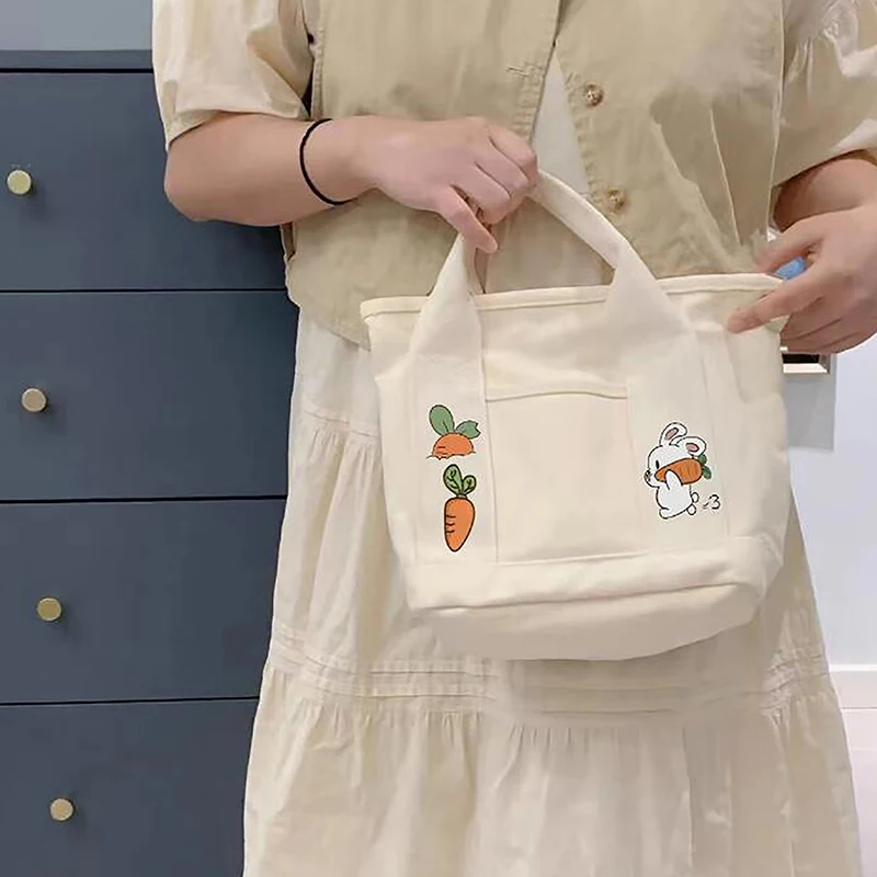 1 bolso de mano de lona con dibujos de conejo y zanahoria para mujer, bolso de mano portátil de gran capacidad con múltiples bolsillos para el almuerzo
