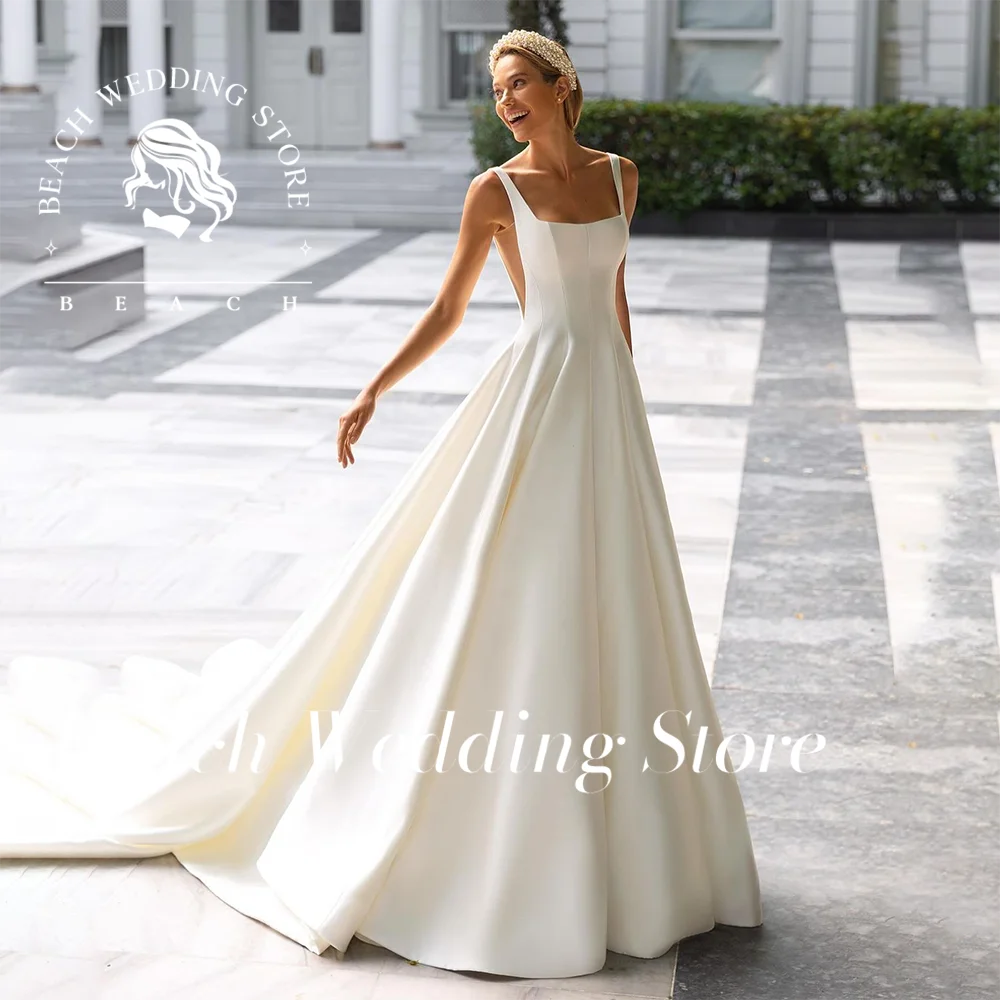 

Beach Customized Spaghetti Straps Square Collar A-Line Backless Wedding Dress 2025 Elegant Satin Sleeveless Backless Bridal Gown