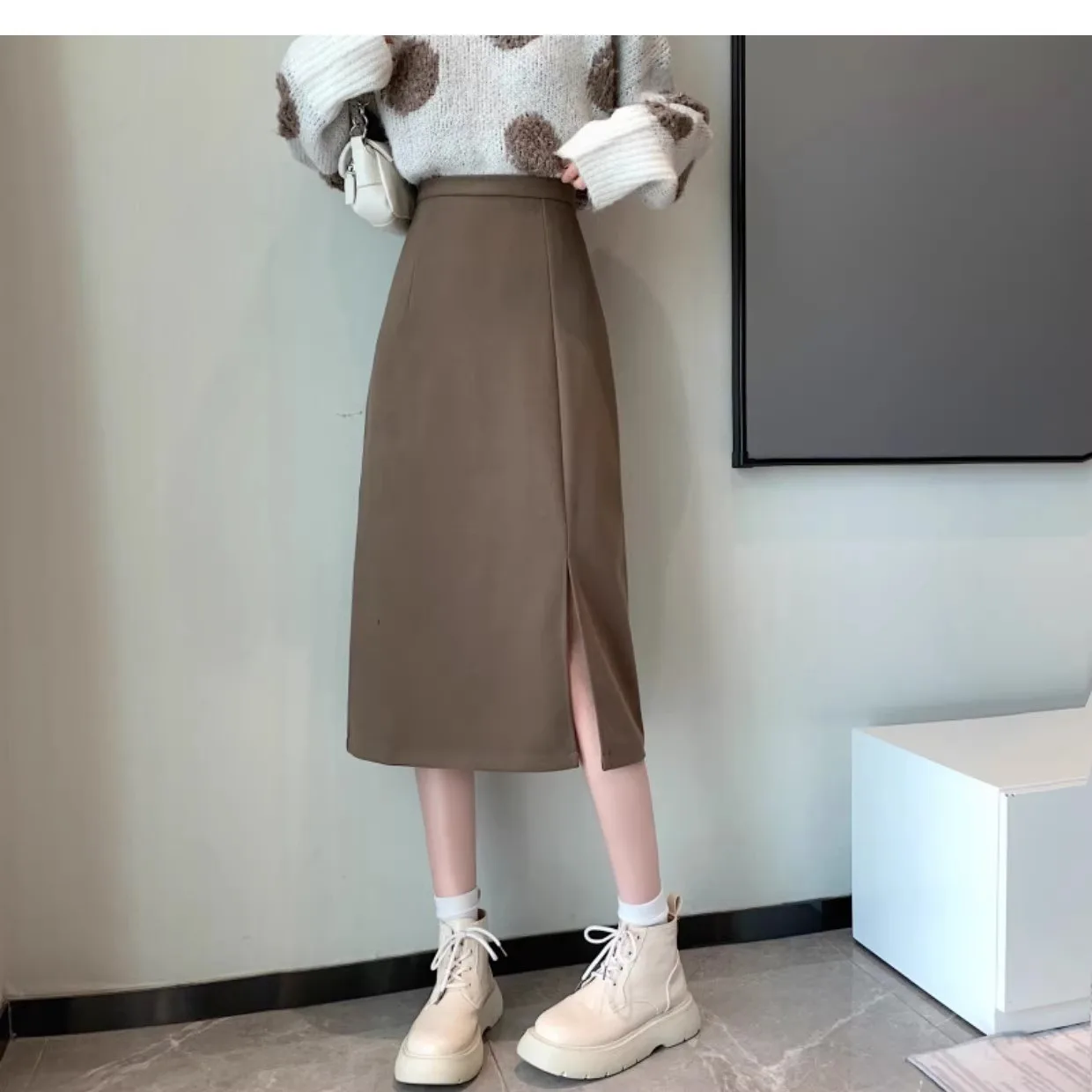 Saia midi preta de cor sólida para mulheres, outono comprimento médio saia evasê, 2025 nova versátil e elegante cintura alta dividida oi