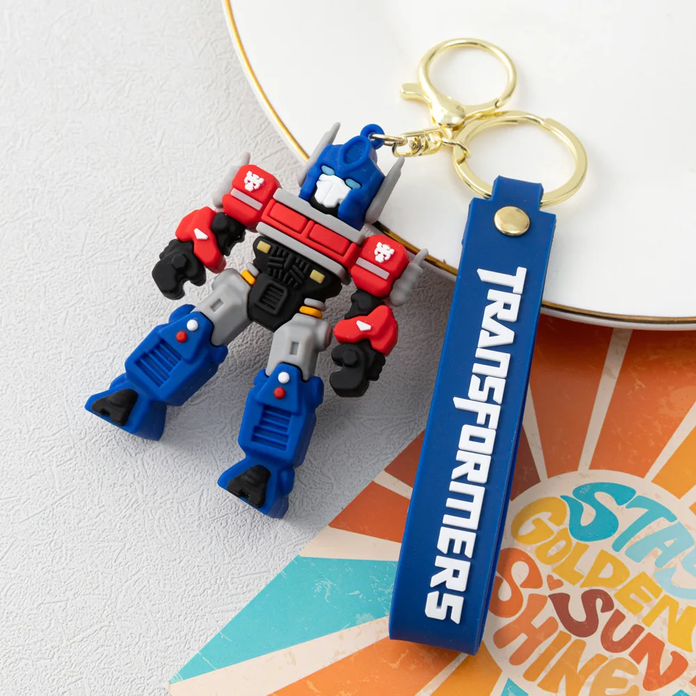 الكرتون فيلم محول مفتاح سلسلة أوبتيموس برايم نحلة روبوت سلسلة مفاتيح سيليكون سيارة مفتاح سلسلة حقيبة قلادة كيرينغ الأصدقاء