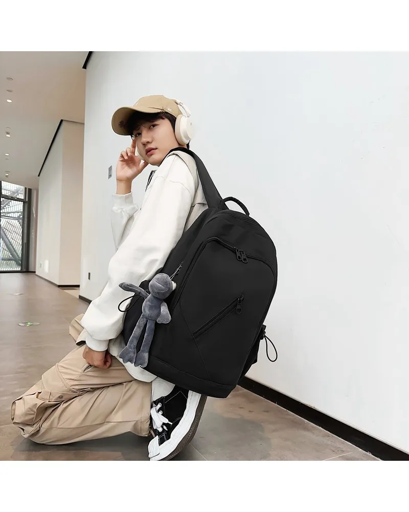 

High-end large-capacity backpack men's backpack versatile solid color schoolbag female college student junior high school