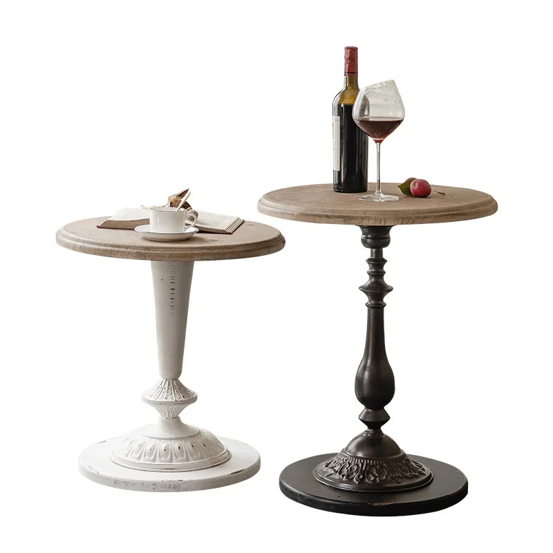 

Small round table in wrought iron coffee shop, a few solid wood retro and old home living room by the casual balcony