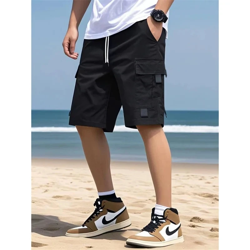 

2025 Summer new style Men's pure color casual cargo shorts Men loose straight leg multi pocket drawstring five quarter pants