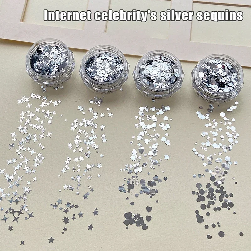 1 กระปุก กลิตเตอร์สีเงินเงา รูปทรงผสม ลายดาว ดาวรัก ลายดาวสไลซ์ สำหรับตกแต่งเล็บ สติ๊กเกอร์ติดเล็บ