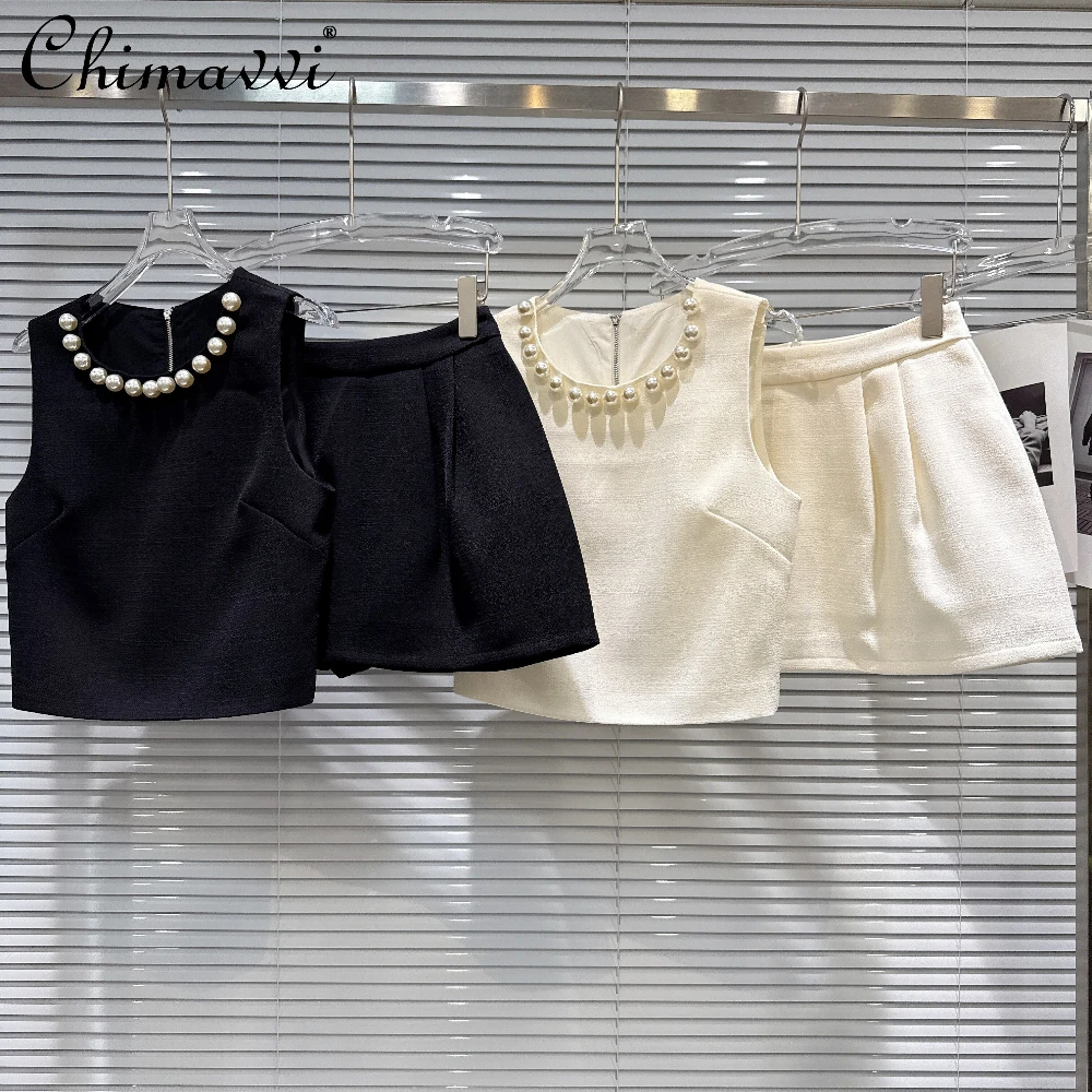 

2026 Summer French Elegant Fashion Socialite Pearl Neck Sleeveless Short Top High Waist A-line Mini Skirt Two-piece Set Women