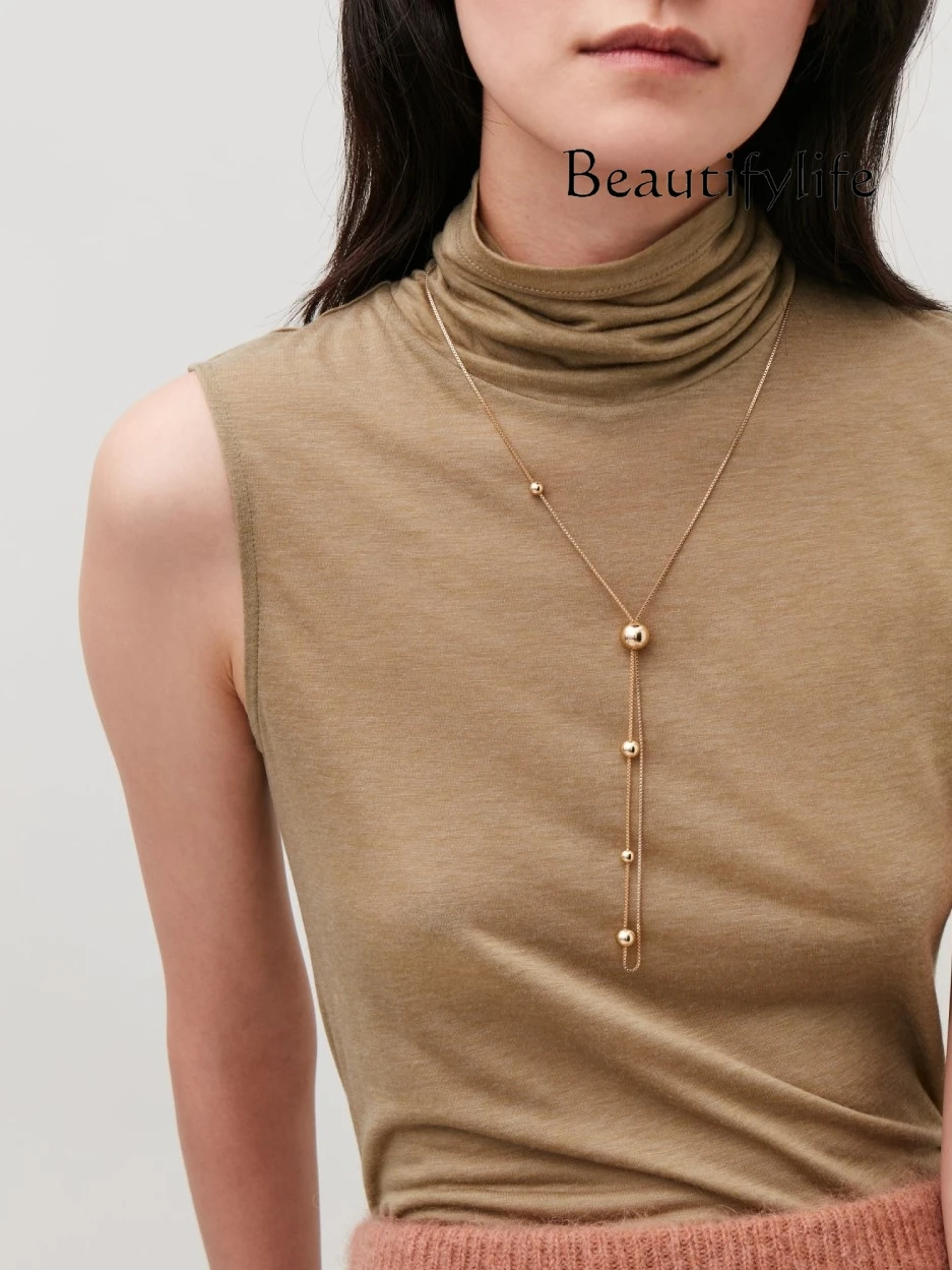 

Temperament Minimalist niche designer small ball light luxury sweater chain high-end long necklace