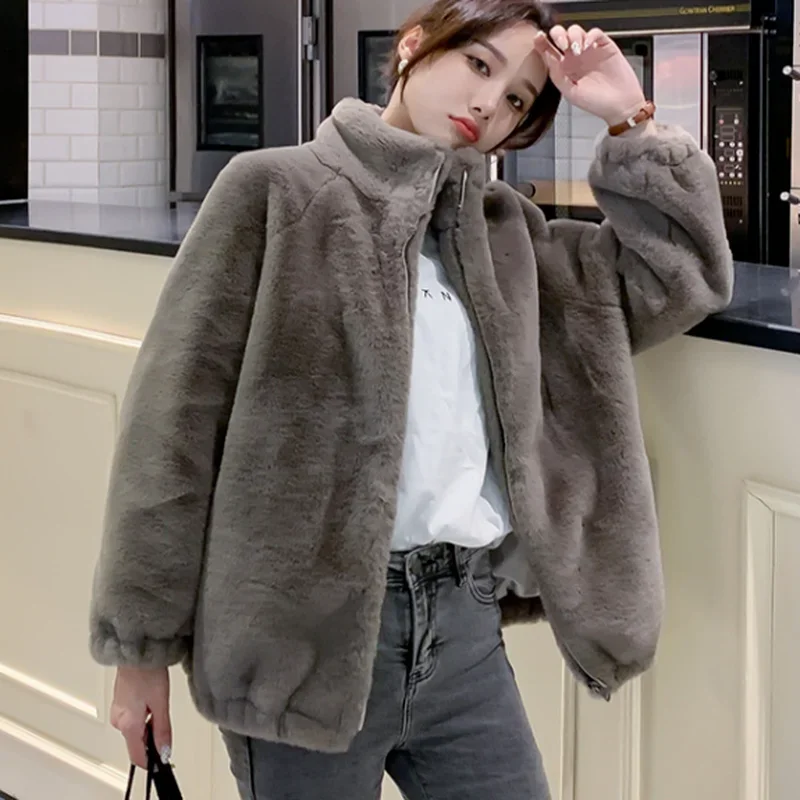 Korea Herbst und Winter Mode Jacke Damen Temperament elegantes Revers geschlitzt lose Taschen warmes Nerz Imitation Fell