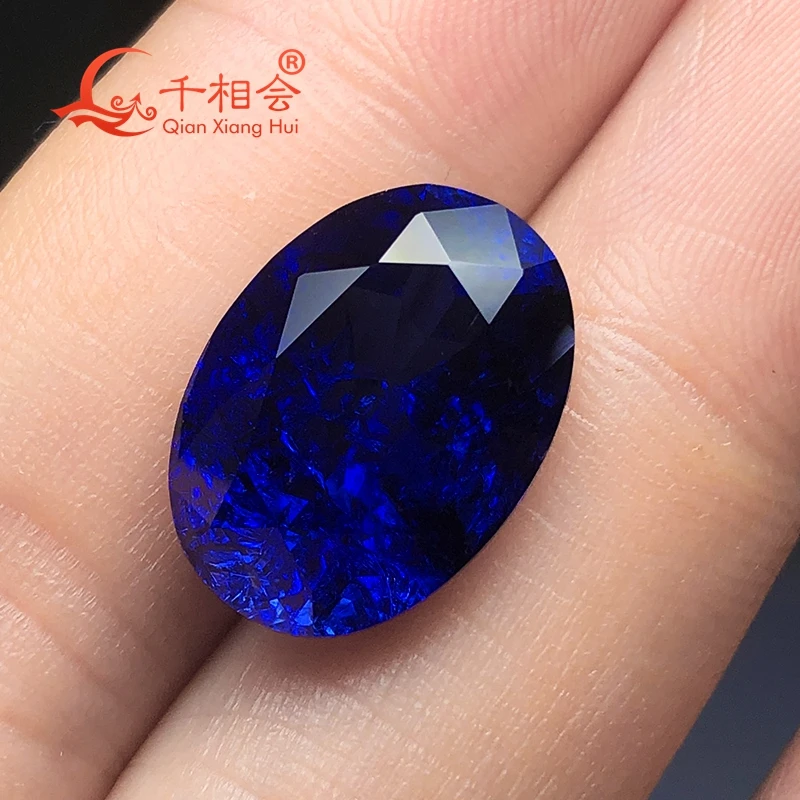 oval shape natural cut Royal blue color  artifical  lab created sapphire including minor cracks and inclusions loose gem stone