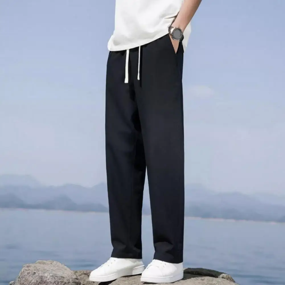 

Men Elastic Waistband Pants Retro Wide Leg Men's Sweatpants with Drawstring Waist Side Pockets for Gym Training Jogging Solid