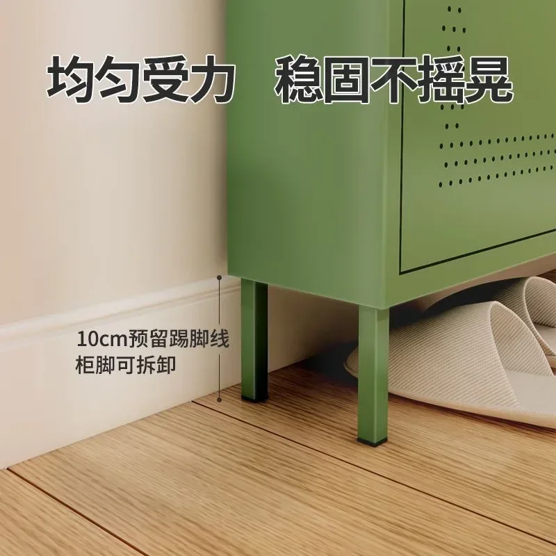 Shoe cabinets are stored at  door of the home, and the entrance is very narrow