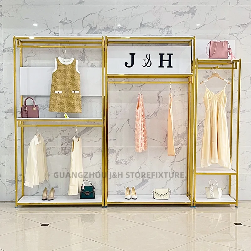 

customized.Custom Metal Garment Rack Retail Boutique Floor Standing Display Rack Women Clothes Rack Clothing Store