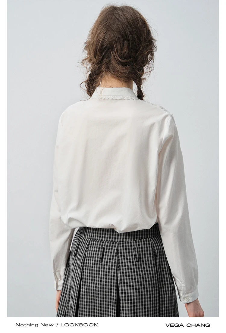 เสื้อเชิ้ตผู้หญิง Vega Chang รุ่นใหม่สำหรับฤดูใบไม้ร่วง ตกแต่งด้วยผ้าลูกไม้และดีไซน์เว้า แขนยาว ติดกระดุมแถวเดียว