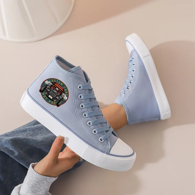 

Women's Light Blue High-Top Canvas Sneakers: Platform Sole, Lace-Up Design with Custom Badge. Ideal for Casual & Campus Looks.
