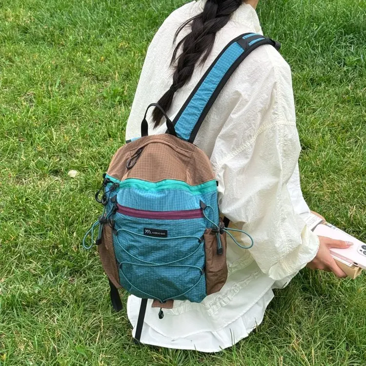 2026 New Outdoor Sports Leisure Large Capacity Backpack Simple Travel Hiking Mountain Climbing Commuting Bag Nylon Material