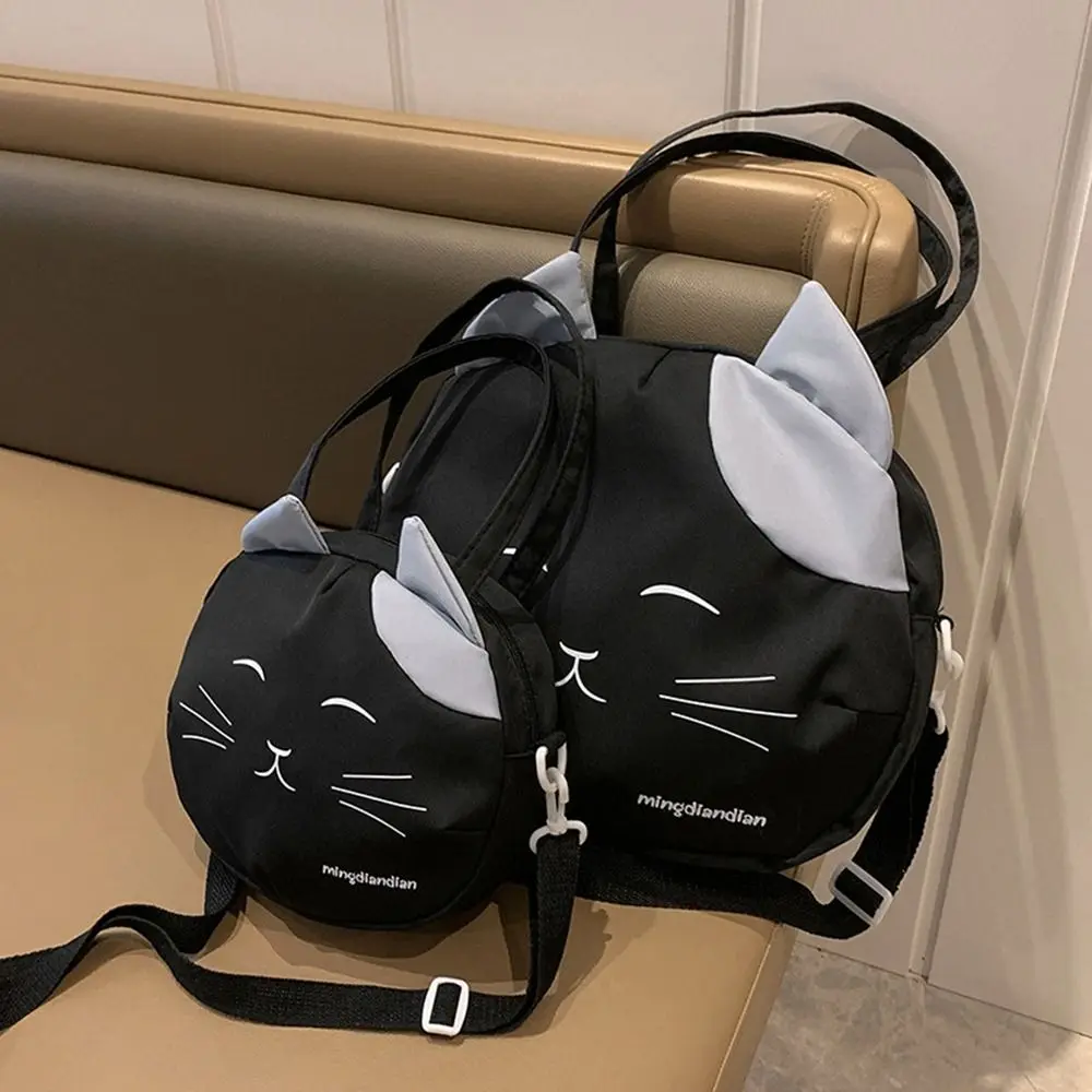 Casual canvas nylon prints kat messenger bag grote capaciteit college stijl handtas schoudertas draagbare crossbody tas meisje