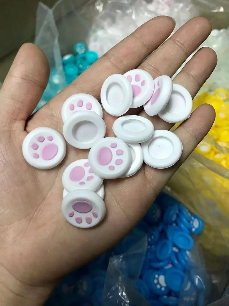 Mejora tus juegos con 4 agarres de pulgar Cat Paw para PS3/PS4/PS5/Xbox, tapas de Joystick de alta calidad para una comodidad y Control superiores.