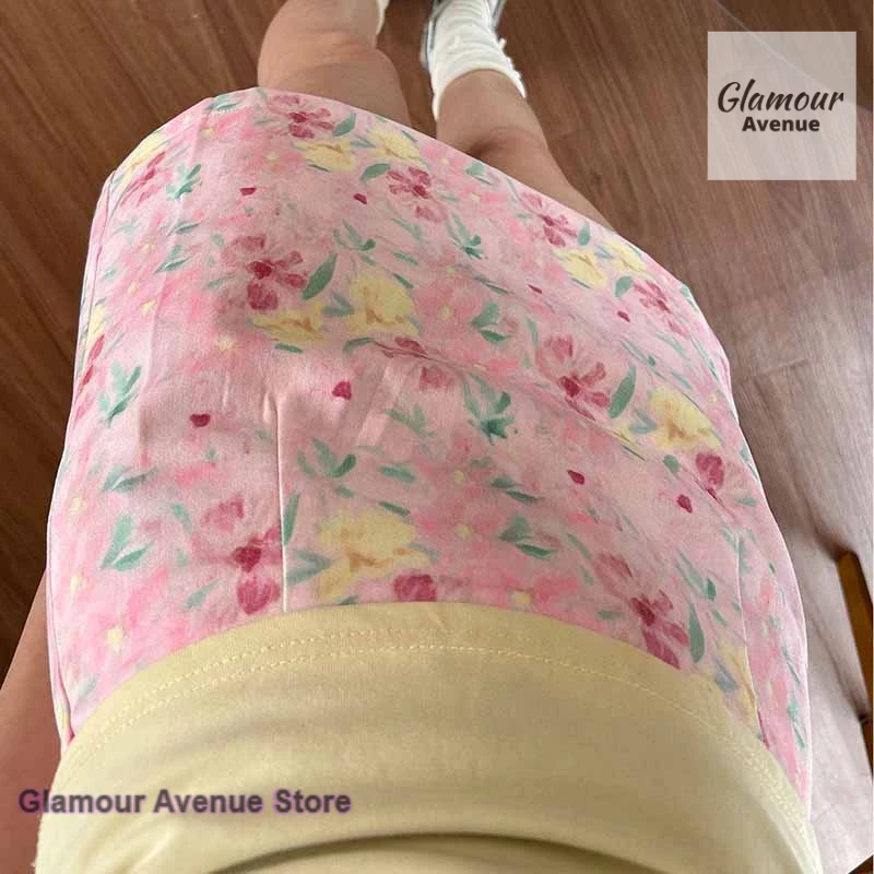 Korean pink floral A-word skirt female spring and summer fashion sweet and lovely niche high waist loose slim one-step hip skirt