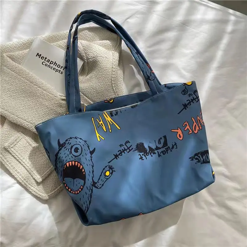 Bolsos de mano versátiles de gran capacidad para mujer, bolsos de hombro que combinan con todo, monstruo de Halloween, dibujos animados, estudiantes, otoño e invierno, 2021