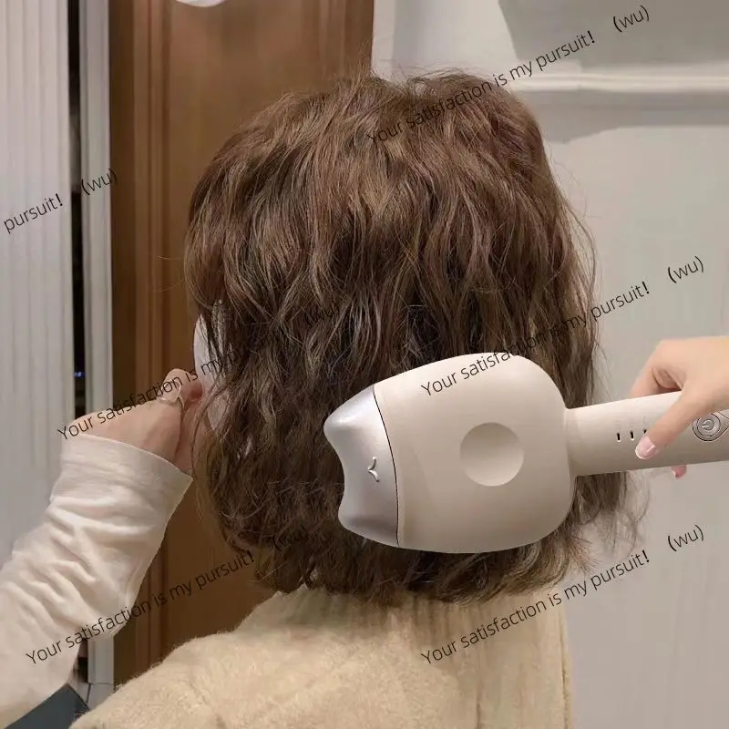 Picture 5: The egg roll curling iron lasts for a long time and does not hurt the hair. Automatic French large roll water ripple.