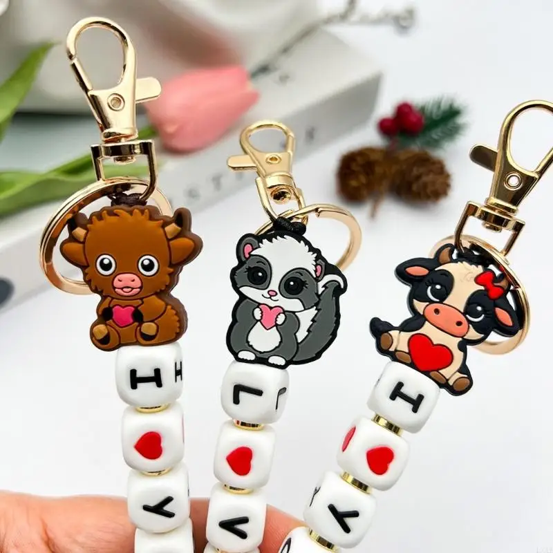 Beaded Keychain Accessory with Soft Silicone Strand, Decorative Charm and Metal Hardware for Key Ring or Bag Accent
