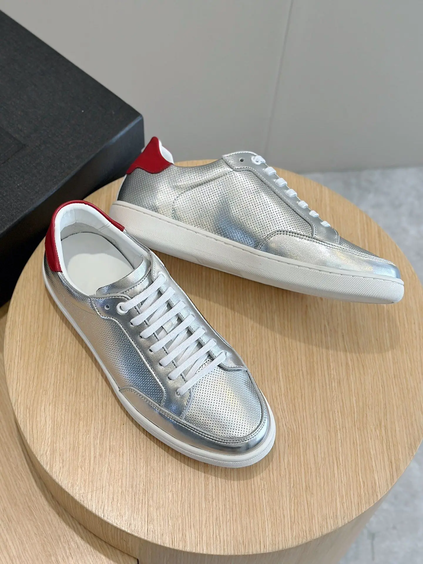 Unisex Low Top Casual Sneakers Silver Metallic Perforated Leather With Red Heel Patch Lace Up White Sole Walking Shoes