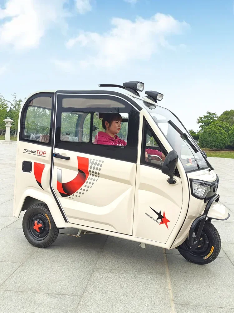 enclosed electric tricycle with shed for home transportation of children, small delivery battery, three cars can be licensed